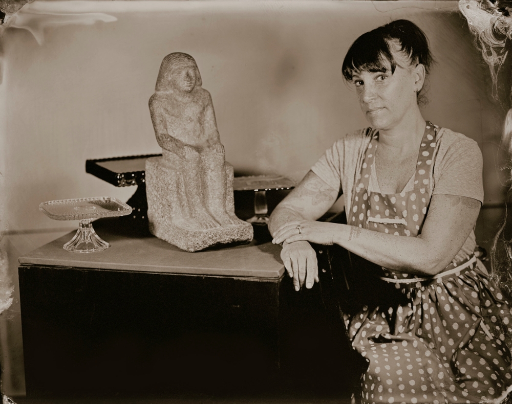 Owner of Chicago dessert bar Hot Chocolate Mindy Segal with statue of Tchenenet the Confectioner, overseer of bakers, 2013