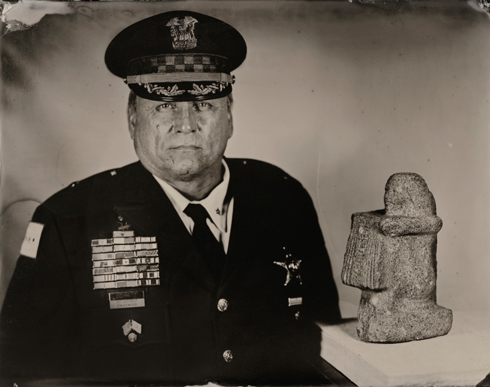 Chicago Police Deputy Chief of Patrol Leo Schmitz and a statue of the Police Chief of Western Thebes, 2013