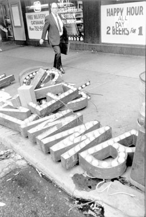 Man Walking by Movie Marque Letters, Chicago, from Changing Chicago