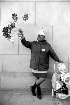 Woman Selling Pinwheels, Chicago, from Changing Chicago