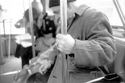 Man with Rings Riding a Bus, Chicago, from Changing Chicago