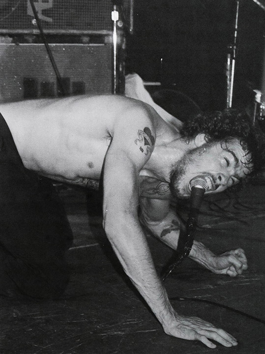 Untitled (Henry Rollins of Black Flag Screaming with a Microphone in His Mouth)