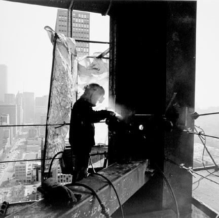 Ironworker Welding a Joint, 900 N. Michigan Avenue, from Changing Chicago