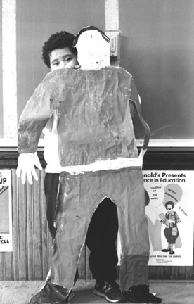 Roberto Hernandez and his Self Portrait, Hans Christian Anderson Elementary School, Chicago, from Changing Chicago