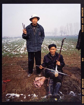 Ma Guozhong (right) Age 59, from the 