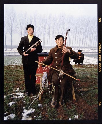 Zhang Xiaochun (right) Age 50, from the 