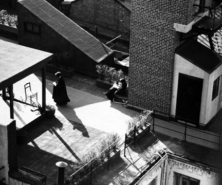 New York (nun reading on rooftop)