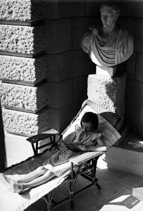 Paris (girl reading in patio chair)