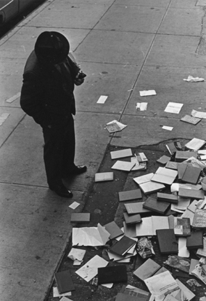 New York (books scattered on sidewalk)