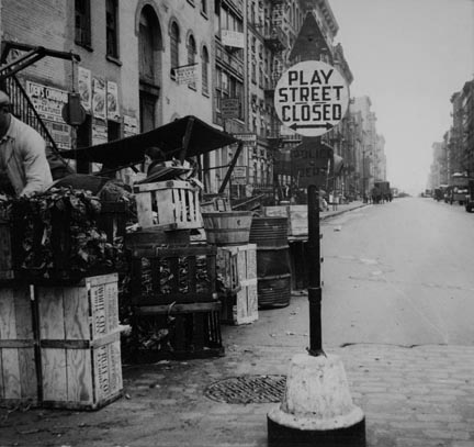 Background photograph for Hightstown project. Play street for children. Sixth Street and Avenue C, New York City. The Solomon family who are to be resettled at Hightstown, live in this neighborhood[…]