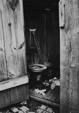 Negro slum, unkept privy, Washington, D.C. Within a few hundred yards of the new House office building is a row of these unkept privies