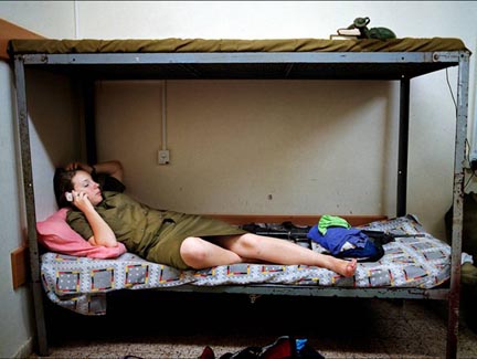 Inbar talking to family during a break from basic training, Shaare Avraham, Israel (#3), from the Serial No. 3817131 portfolio