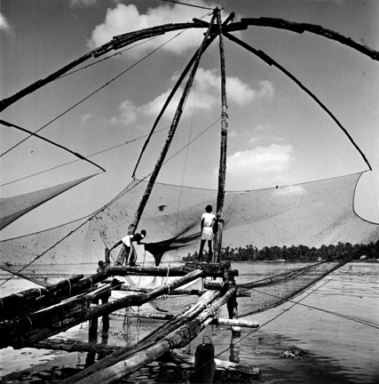 La India (two men with nets on water)