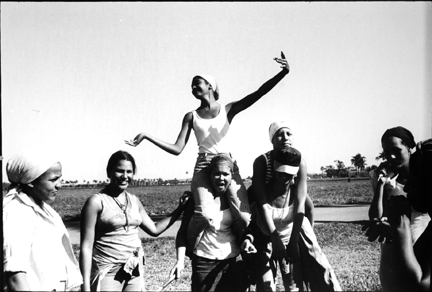 Field (girls, one on other's shoulders)