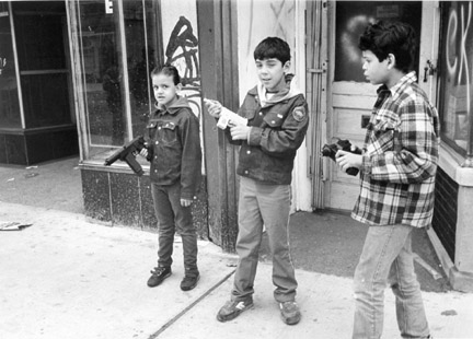 A Group of Young Boys Play 'Cops' in S. Chicago