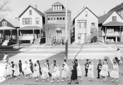 A Group of First Holy Communion Pass the St. Michaels Rectory on Their Way to Church, May 1, 1987, from Changing Chicago