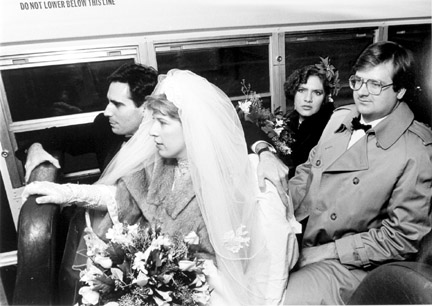 Michael and Maryann Shiffer Aboard a Bus That Will Take Them to the Train Station
