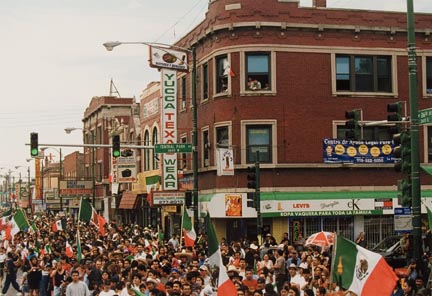 Thousands of Spectators Wave Flags and Cheer During the Annual Mexican Independence Parade Down 26th Street in Chicago's Neighborhood of Little Village, September 1994