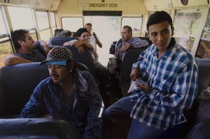 Farm Workers Take a Break After Weeding a Basil Field, in Momence, Inside a Bus Used Both for Transportation and as a Resting Place Away from the Harsh Sun, July 2010