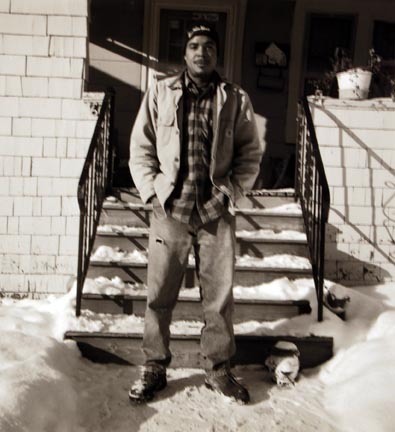 Untitled (man with snow in front of stairs)