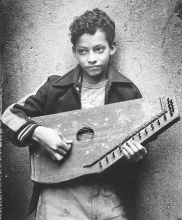 Boy with Zither, 105th Street, New York