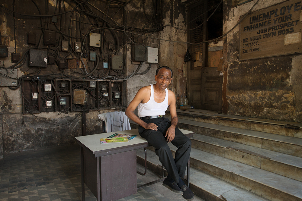 Man on Desk, Calcutta, 2012